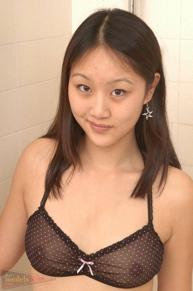 Asian amateur Evelyn slips off three piece lingerie to get naked in a shower - #3