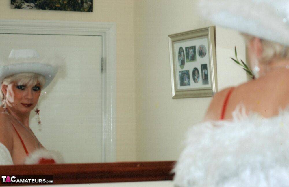 Mature amateur Dimonty models sexy lingerie during a Christmas shoot - #10