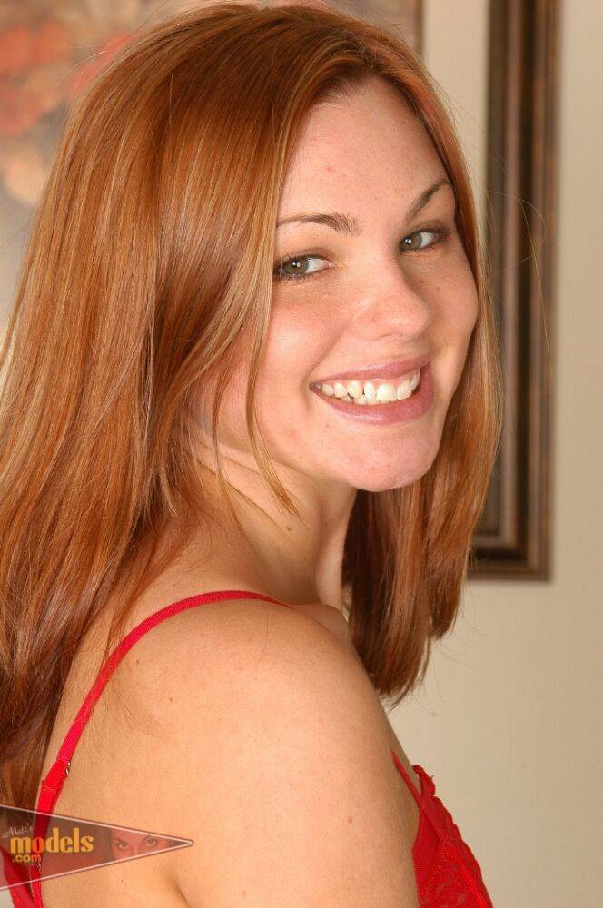 Sweet redhead Jasmine slides her red panties aside in her modeling debut - #16