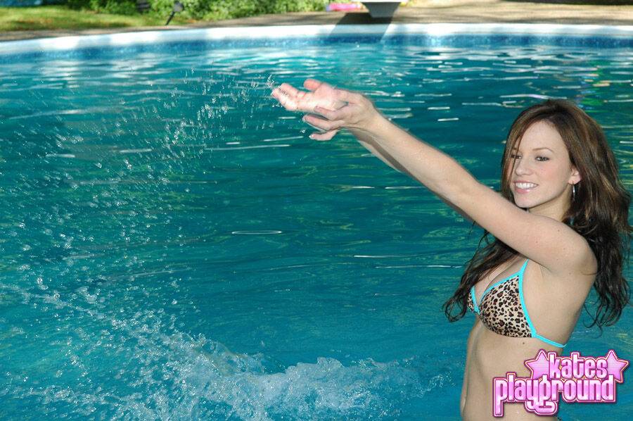 Teen first timer models non nude in a string bikini out in the pool - #4