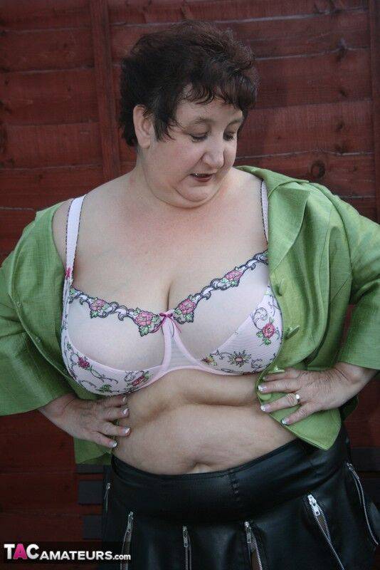 Fat older woman Kinky Carol models a bra and microskirt in over the knee boots - #15