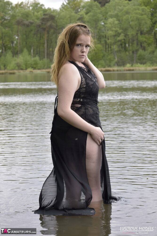 Redheaded amateur Luscious Models models lingerie while in a lake - #5