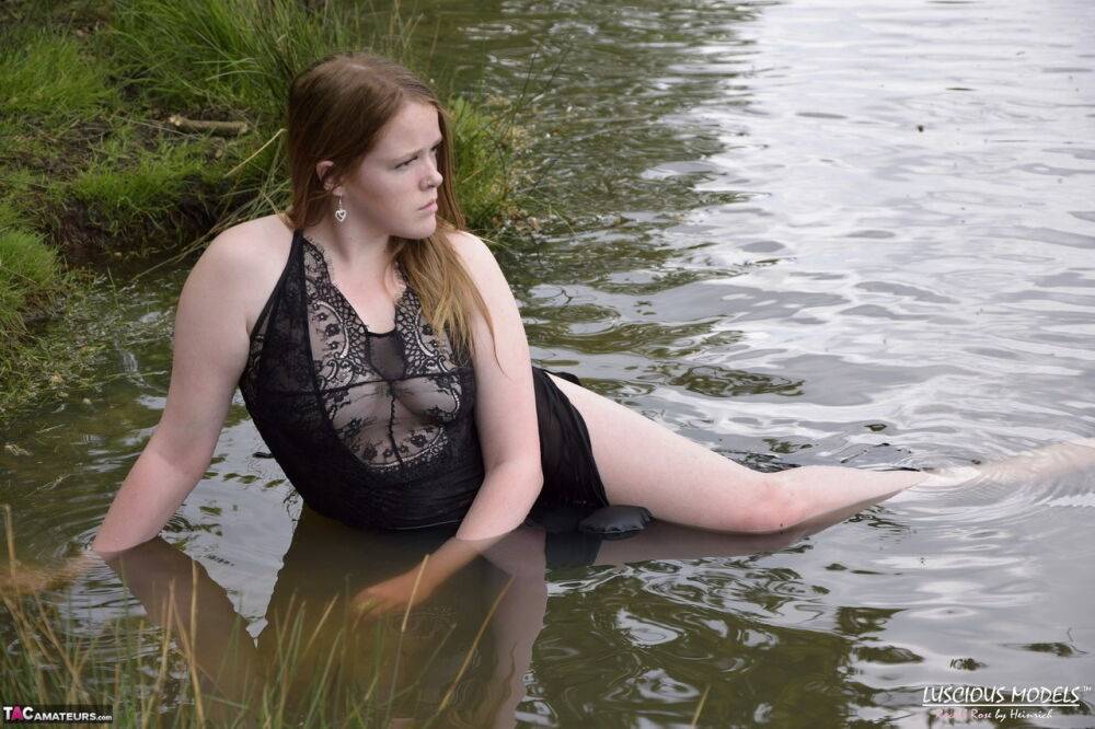 Redheaded amateur Luscious Models models lingerie while in a lake - #7