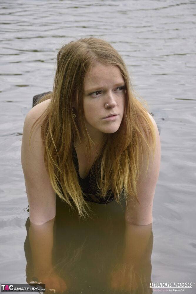 Redheaded amateur Luscious Models models lingerie while in a lake - #9