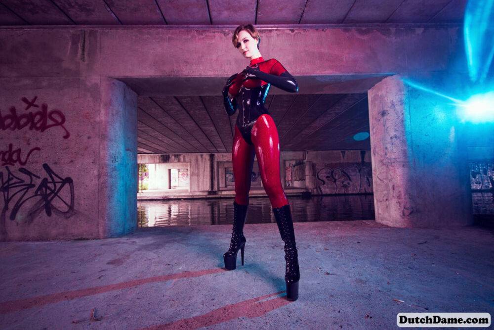 Solo models pose for a non nude shoot in sensual outfits made of latex - #15