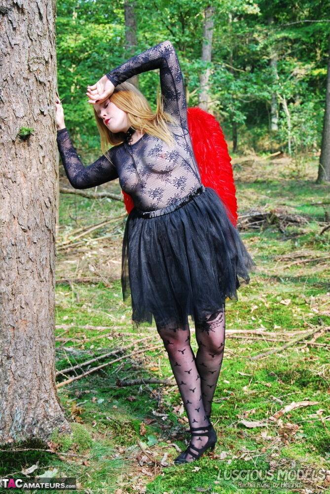 Amateur woman Luscious Models poses in the forest in a cosplay clothing - #7