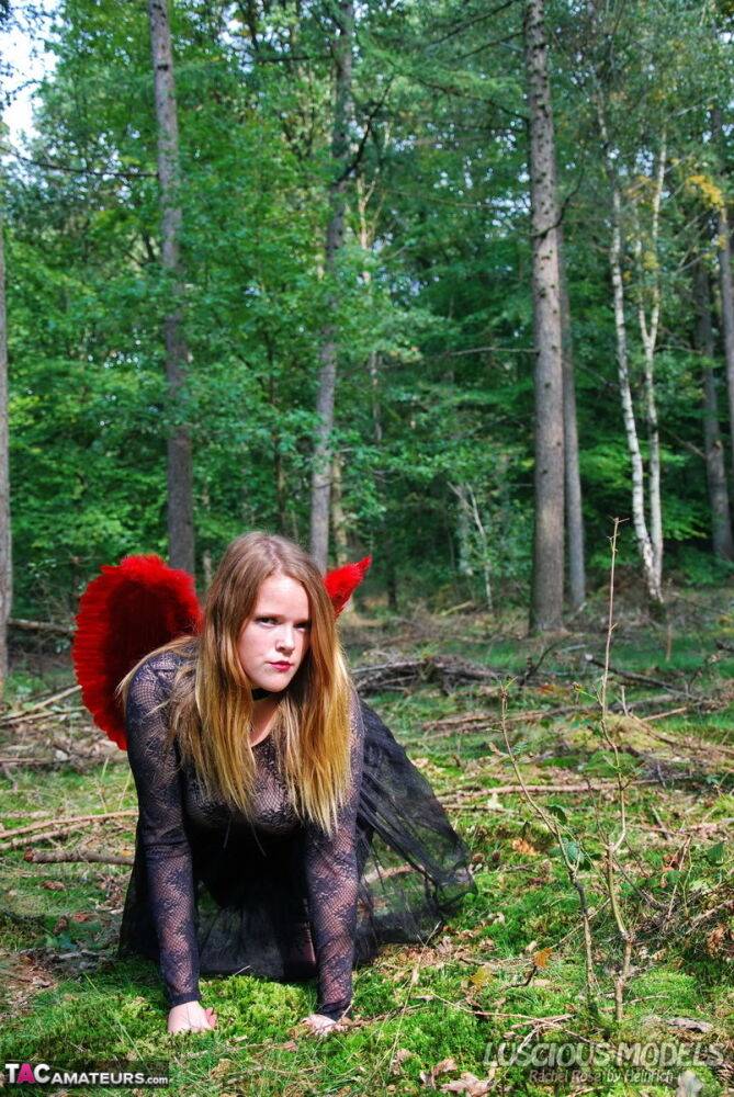 Amateur woman Luscious Models poses in the forest in a cosplay clothing - #2