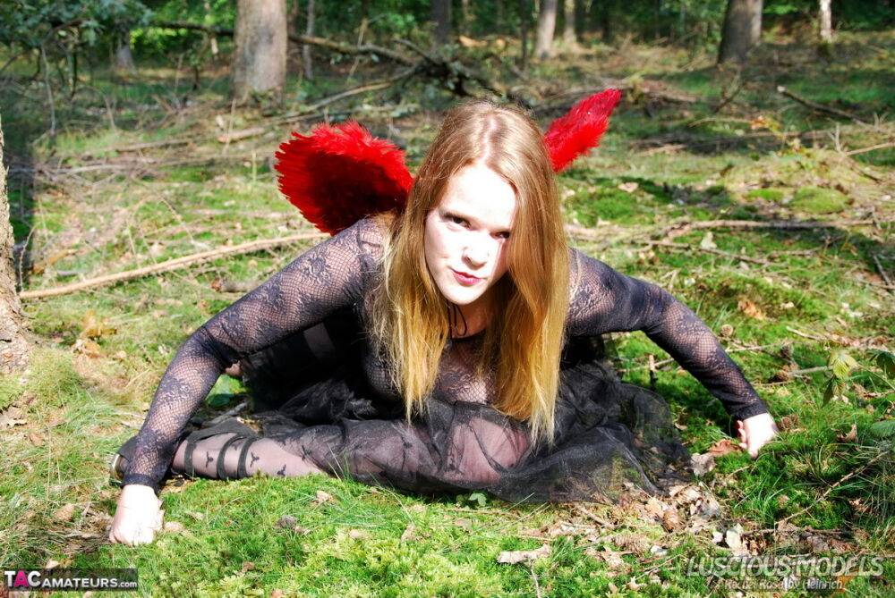 Amateur woman Luscious Models poses in the forest in a cosplay clothing - #10