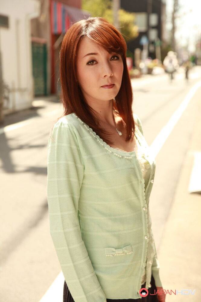 Japanese redhead Chika Sasaki models in a sweater and skirt in the road - #13