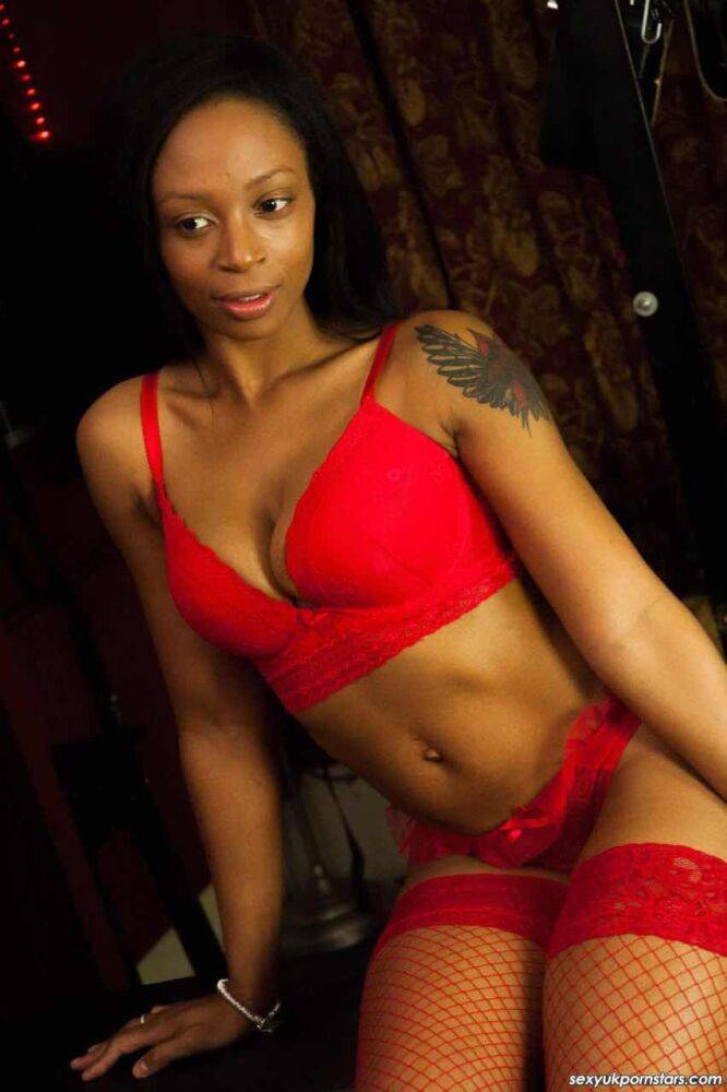 British black girl Lola Marie models red lingerie and matching stockings - #1