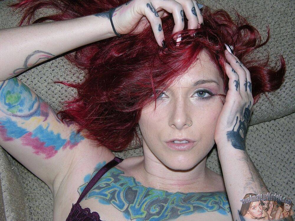 Tattooed redhead Lola takes off her glasses and clothes for her first nudes - #4