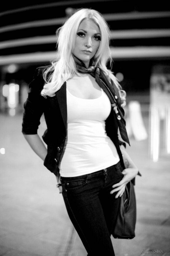 Platinum blonde models fully clothed during an outdoor shoot - #9