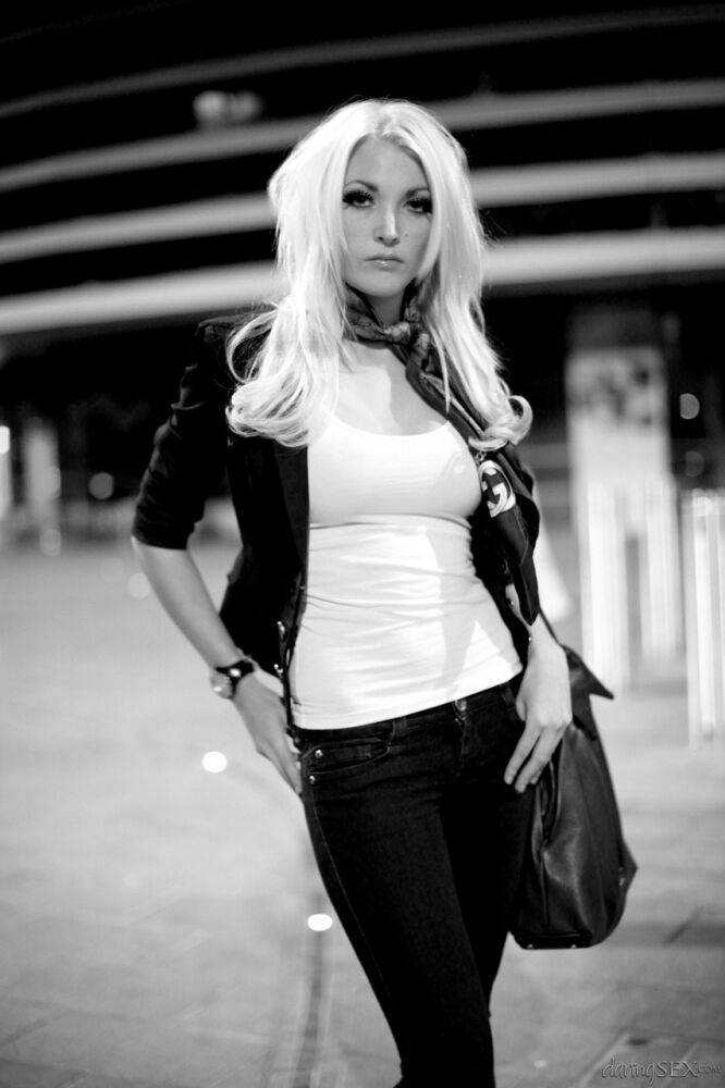 Platinum blonde models fully clothed during an outdoor shoot - #3