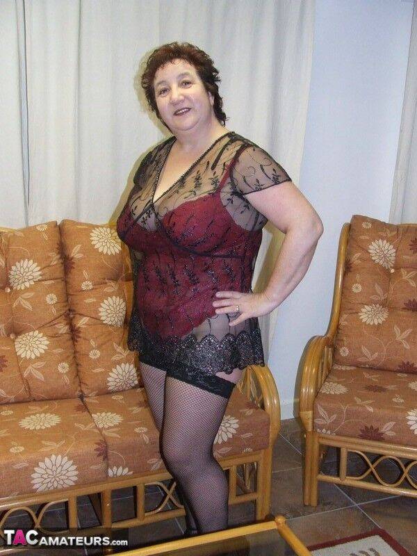 Mature BBW Kinky Carol models sexy lingerie in mesh stockings and heels - #6