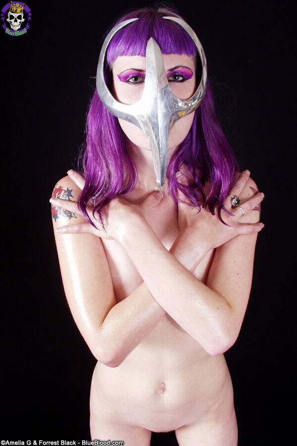 Naked girl with an ass to die for Szandora models a chrome Cell mask - #11