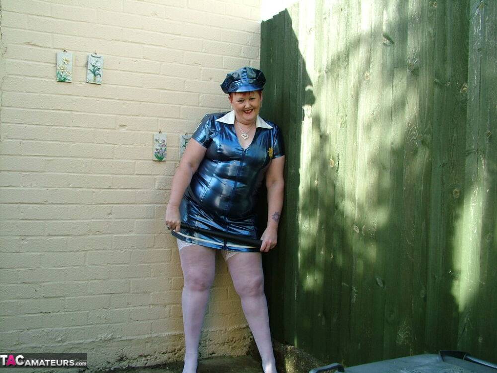 Mature plumper Valgasmic Exposed models latex police attire in white stockings - #6