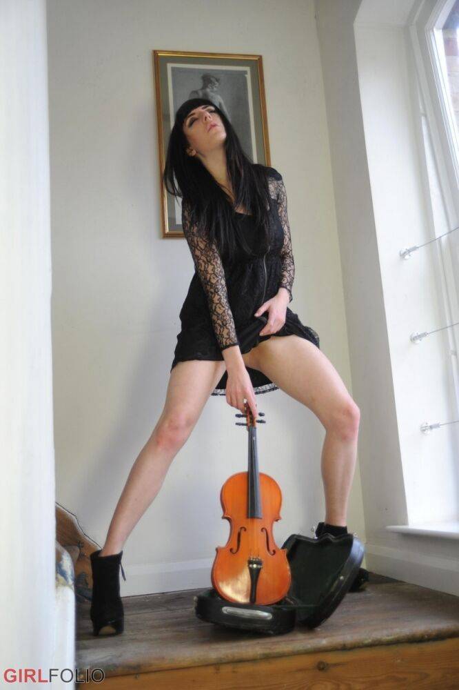 Dark haired violin player Sam Bentley strikes great poses while getting naked - #8