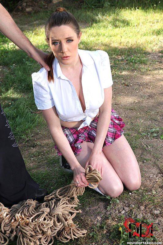 Schoolgirl Samantha Bentley finds herself suspended from ropes in the woods | Photo: 2741396