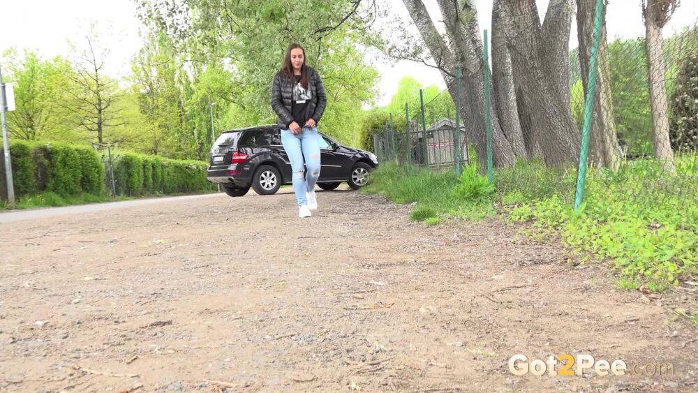 Solo girl Naomi Bennet takes a pee on a gravel roadway when caught short - #7