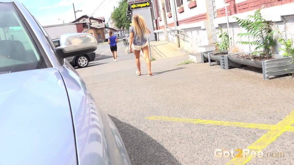 Naomi Bennet and Jena Lovely squat to pee on a narrow road in a village - #8