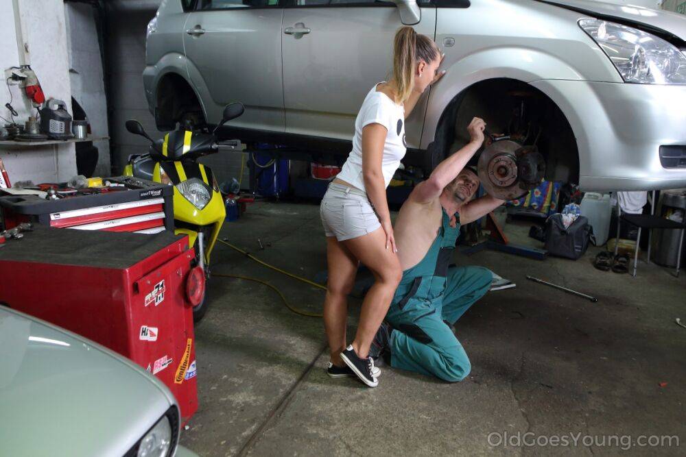 Horny teen Naomi Bennet seduces an old mechanic while he works on her car - #10