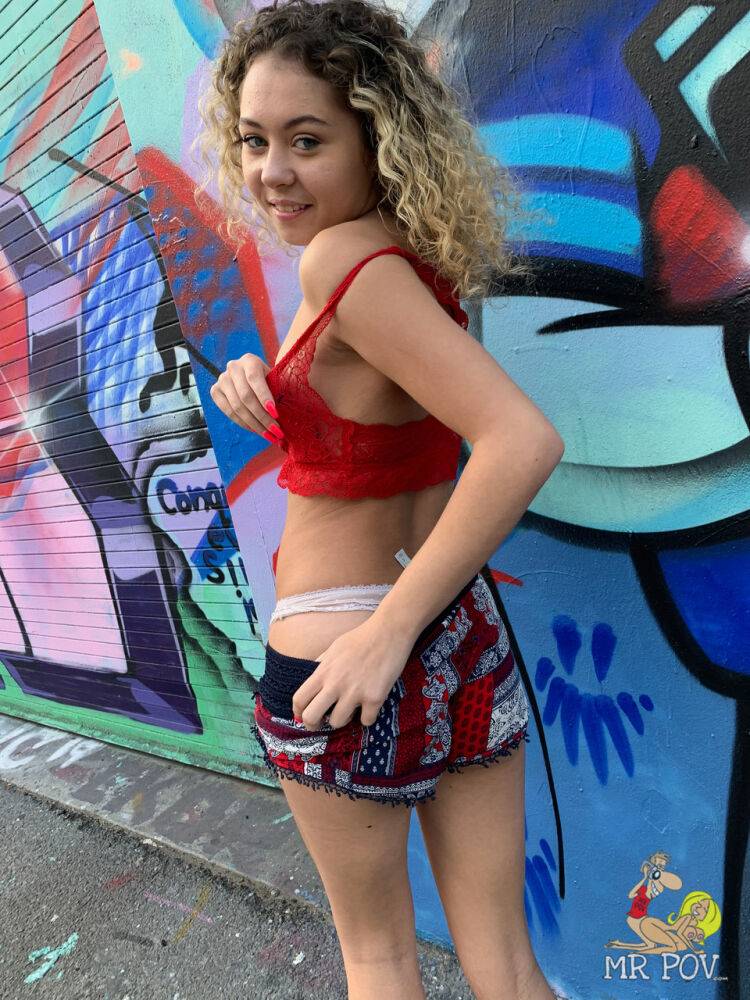 Petite girl drips jizz from chin after exposing herself amid graffiti - #12