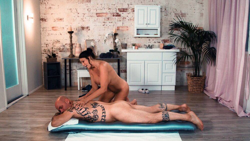 Brunette masseuse Reagan Foxx has sex with a client during a nude massage - #12