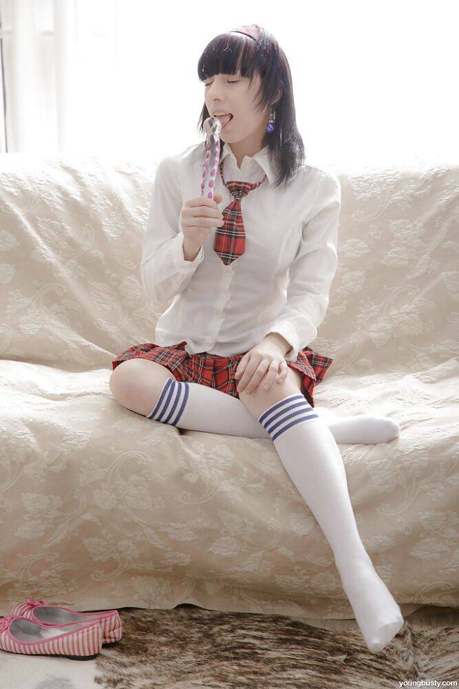 Brunette babe Serena C revealing big teen breasts in knee high socks - #2