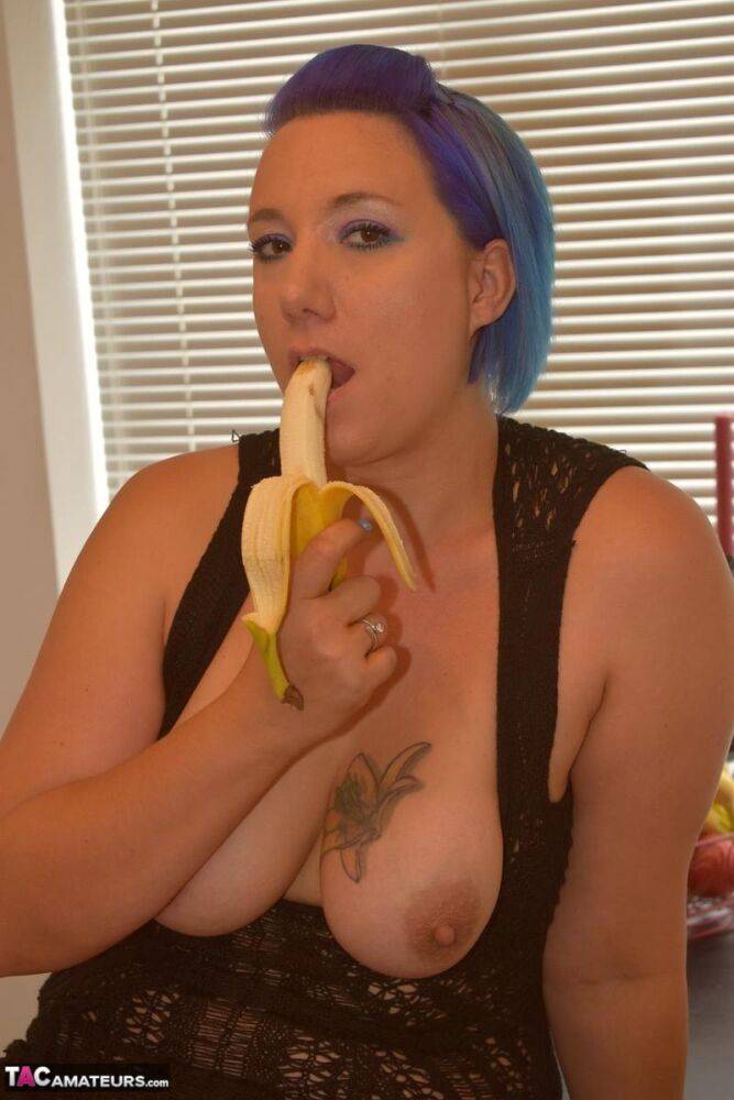 Overweight amateur Sara Banks eats a banana while showing her tits and twat - #8