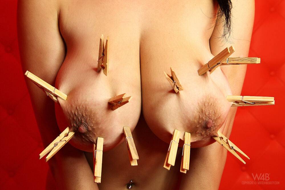 Naked female Shione affixes clothes pegs to her hooters and tongue - #2