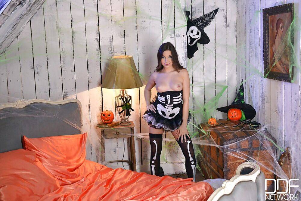 Brunette Euro babe Diana Dolce strutting in stockings and Halloween uniform - #5