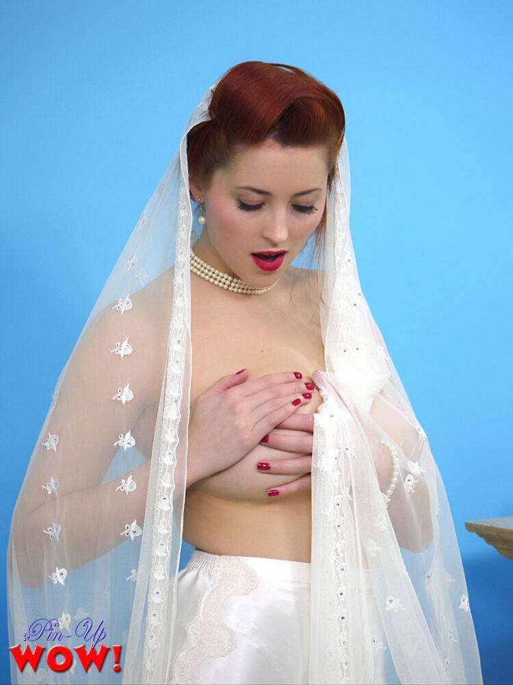 Natural redhead Lucy V slips off her wedding dress to bare big natural tits - #10