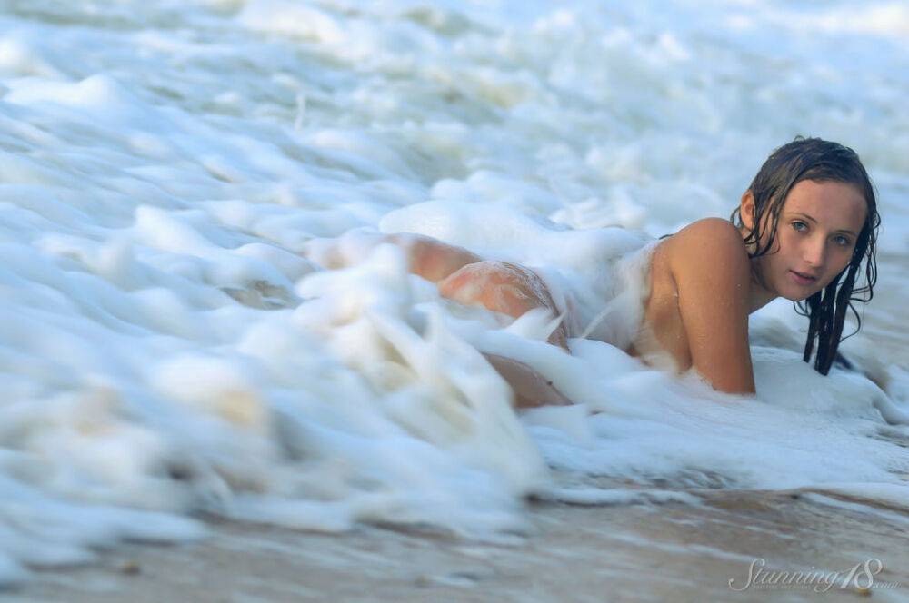 18-year-old beauty Tressa G strikes great nude poses in ocean surf - #12