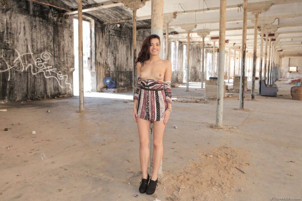 Caucasian girl Penelope Cum disrobes in an abandoned warehouse before sex - #11