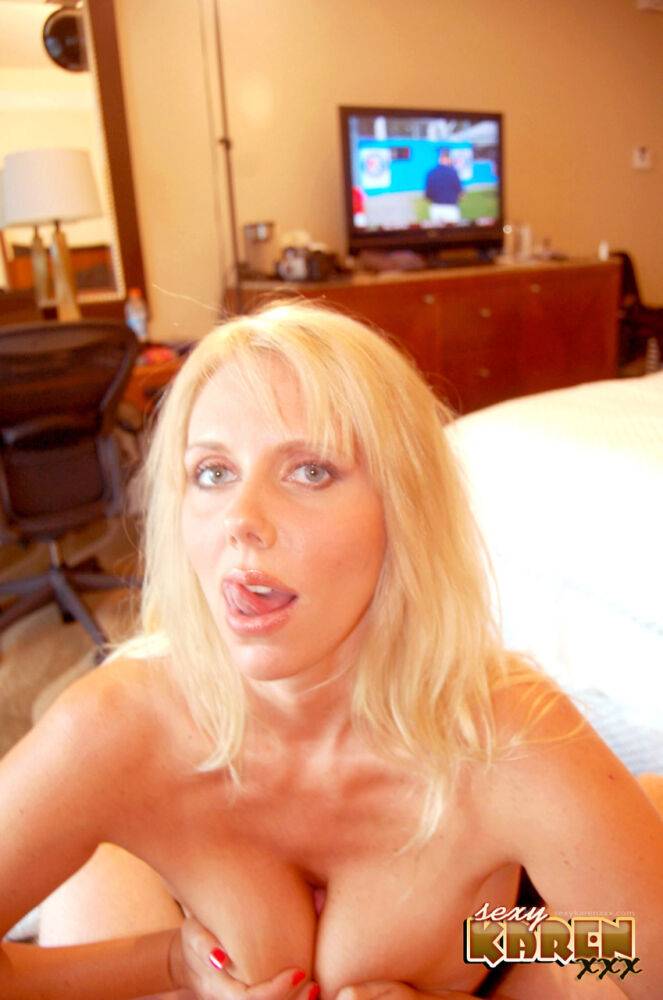 Blonde woman Karen Fisher concludes a POV blowjob with cum on her big breasts | Photo: 2929138