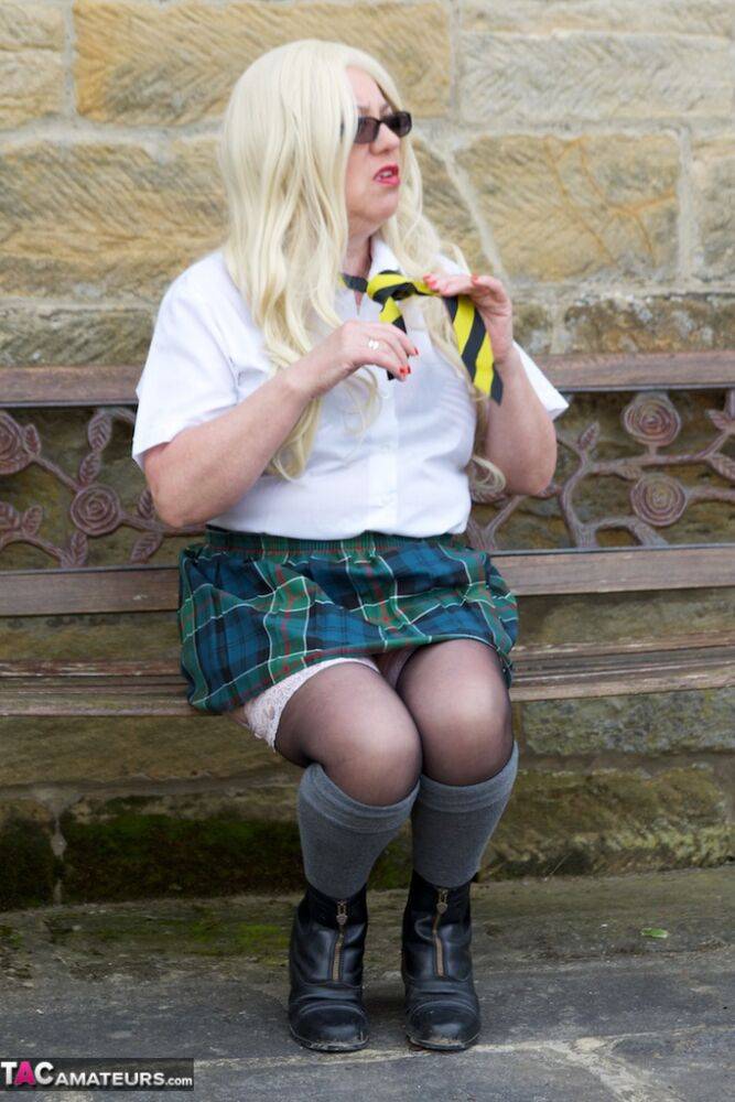 UK blonde Barby Slut masturbates on a garden bench while in schoolgirl attire - #3