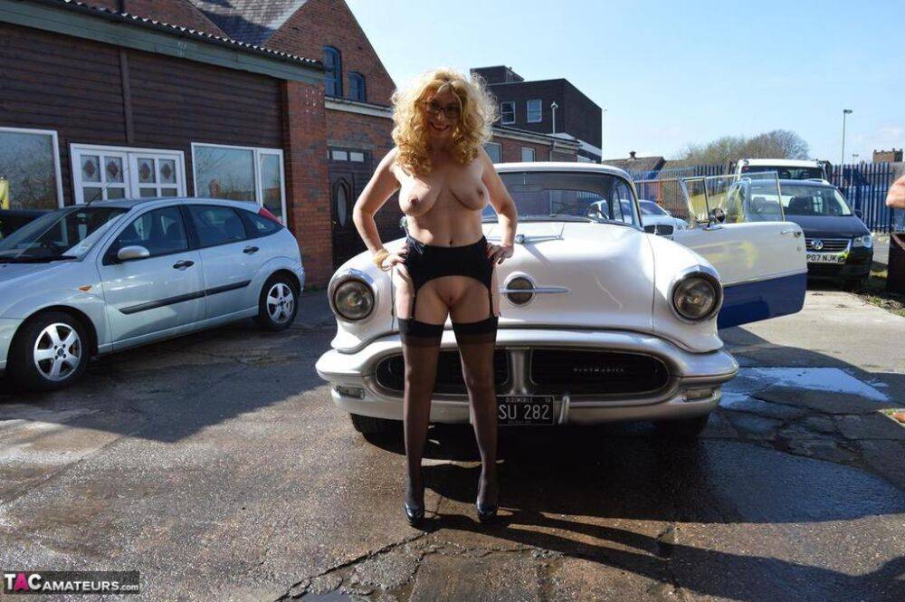 Blond amateur Barby Slut flashes by a vintage auto before sex at home on a bed - #15