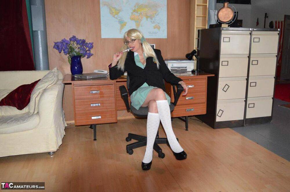 Older blonde Barby Slut exposes herself while wearing schoolgirl clothing - #10