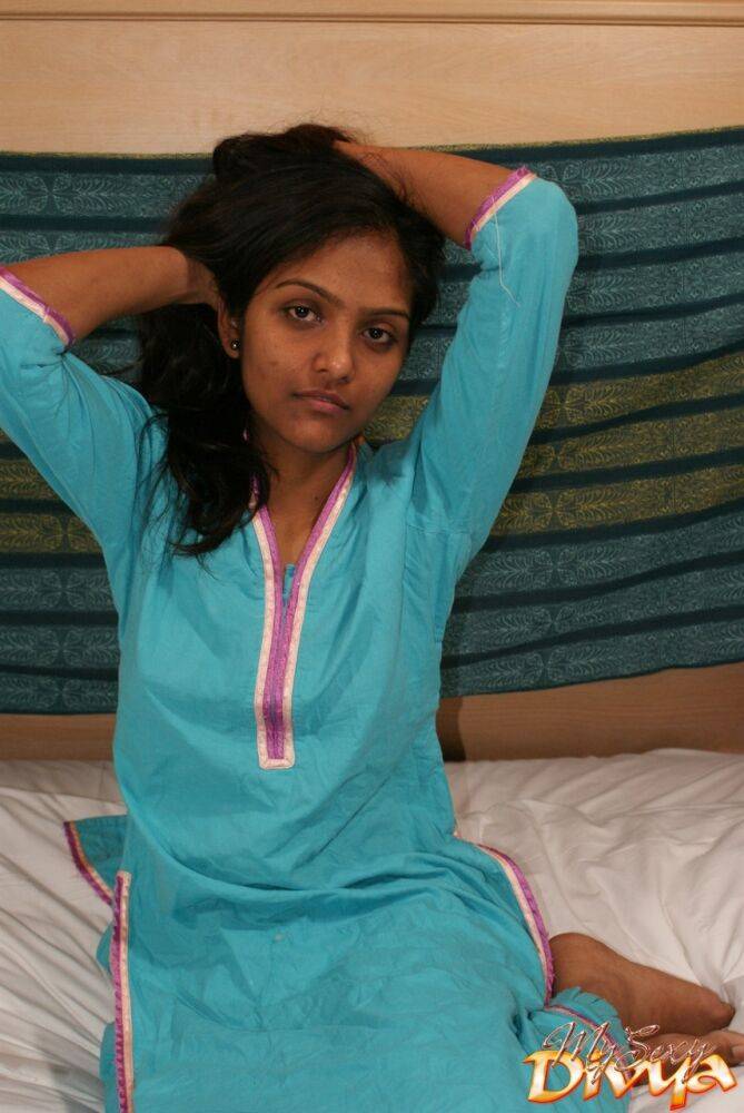 Hot Indian slut Divya removes her shirt to show her big dark nipples - #9