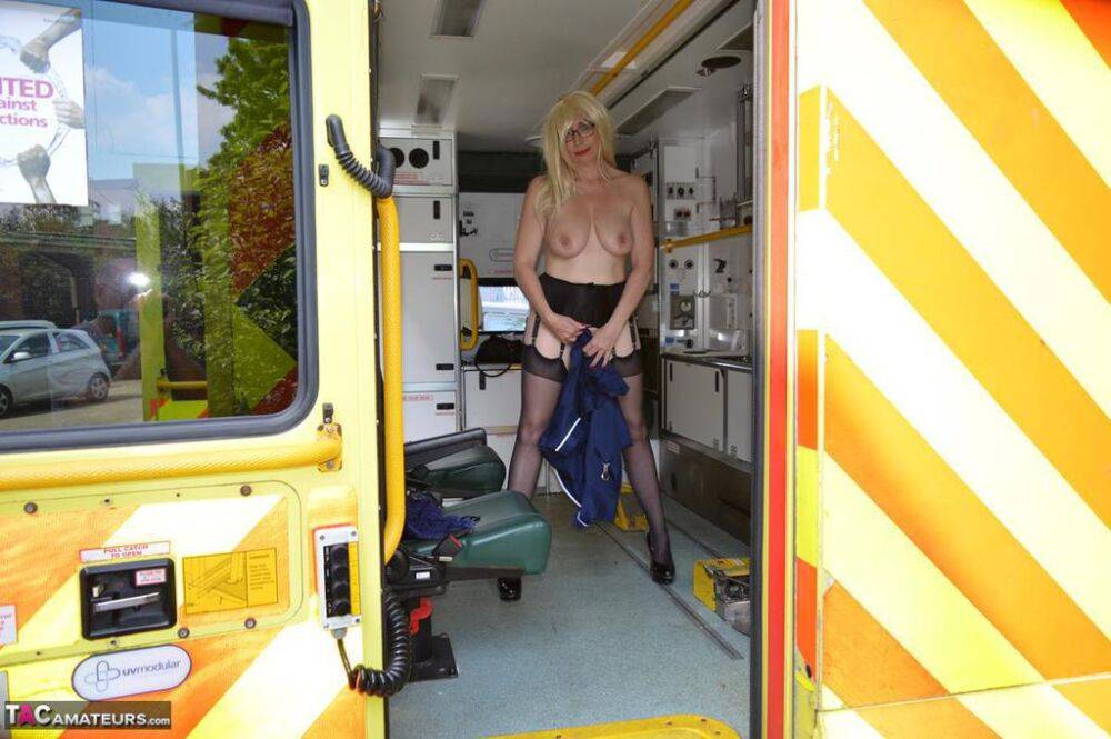 Older blonde nurse Barby Slut gives a blowjob inside an ambulance - #4