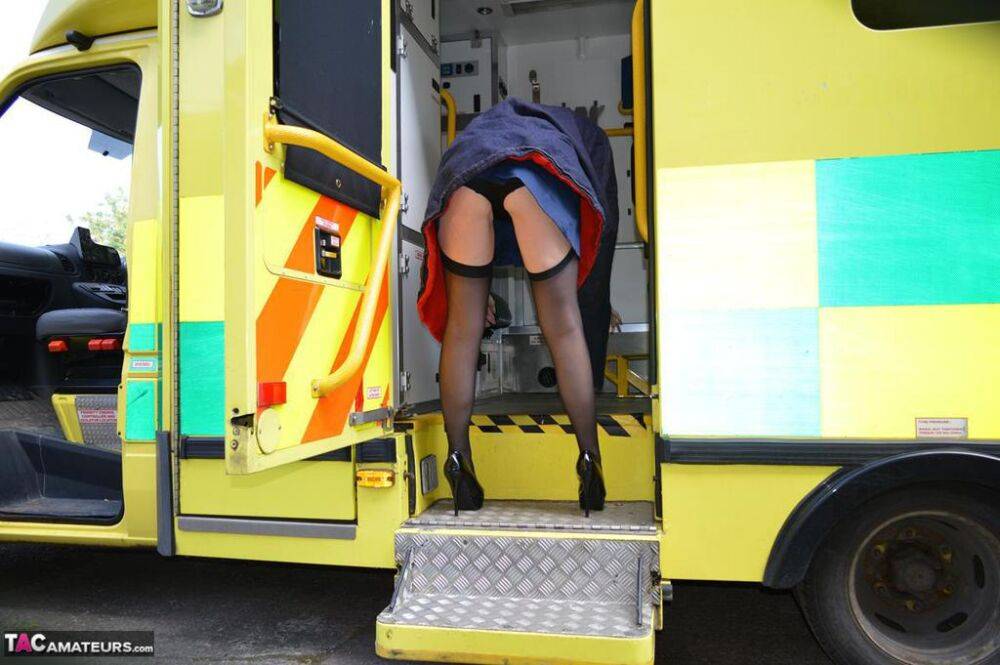 Older blonde nurse Barby Slut gives a blowjob inside an ambulance - #5