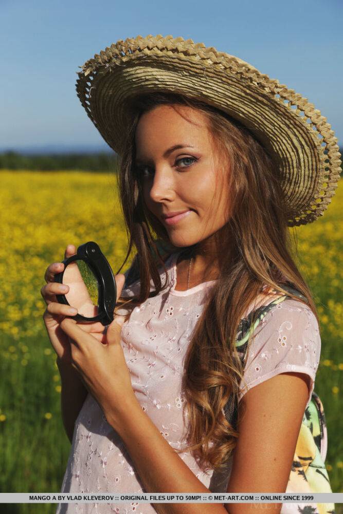 Country girl Mango A loses her shorts to crawl around nude in the sunny field - #13