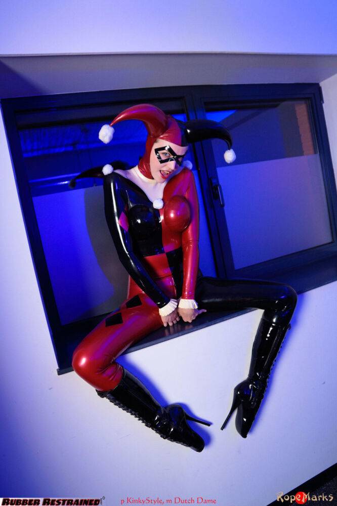 Solo model Dutch Dame poses in a Harley Quinn themed latex outfit - #9