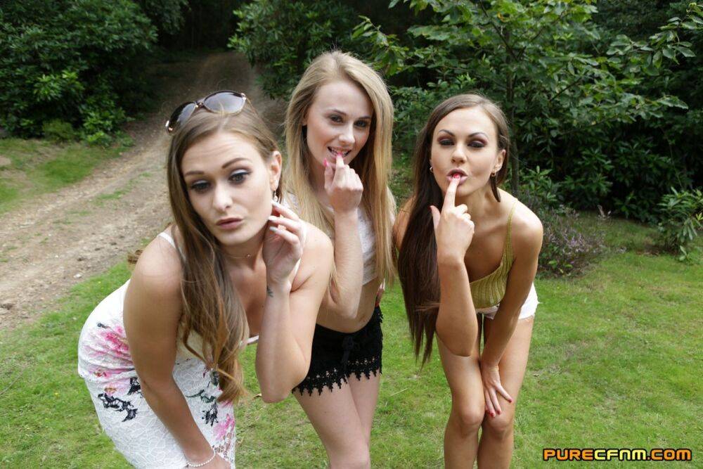 Lucky fella receives a triple blowjob in public from insatiable teenage babes - #13