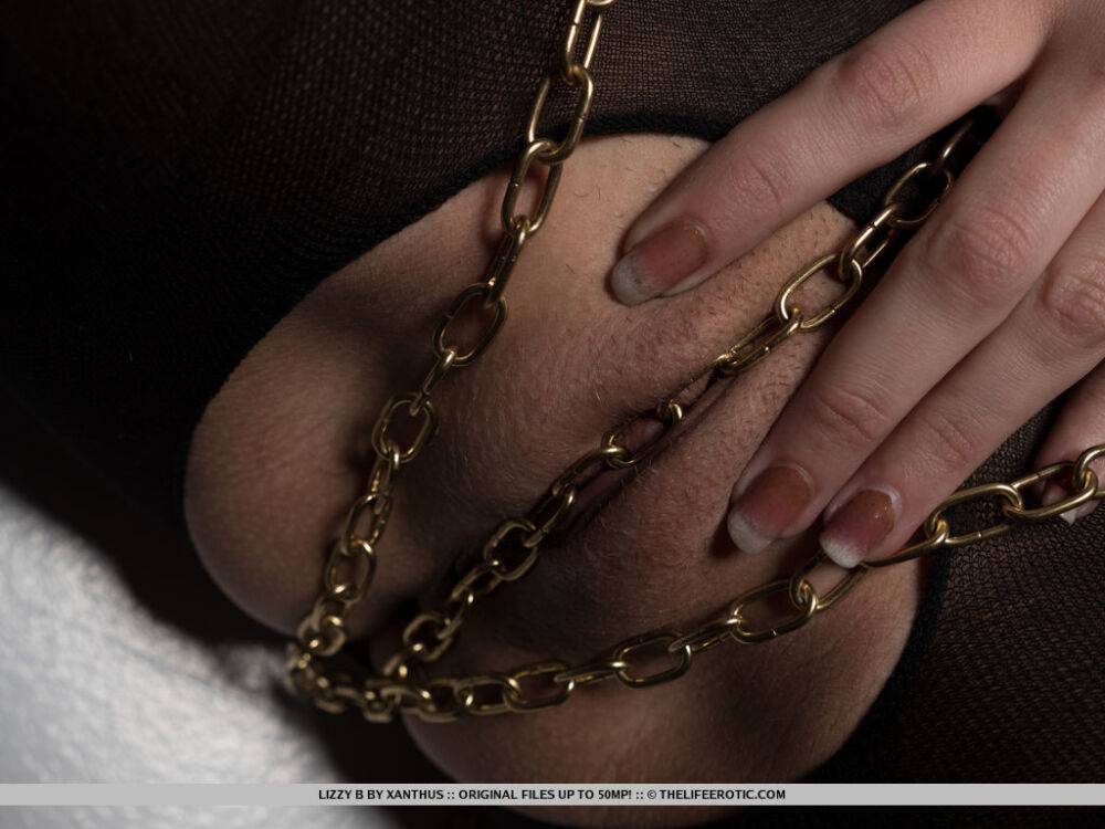 Lizzy B has her body tied up by golden chains and rubs it againts her - #10