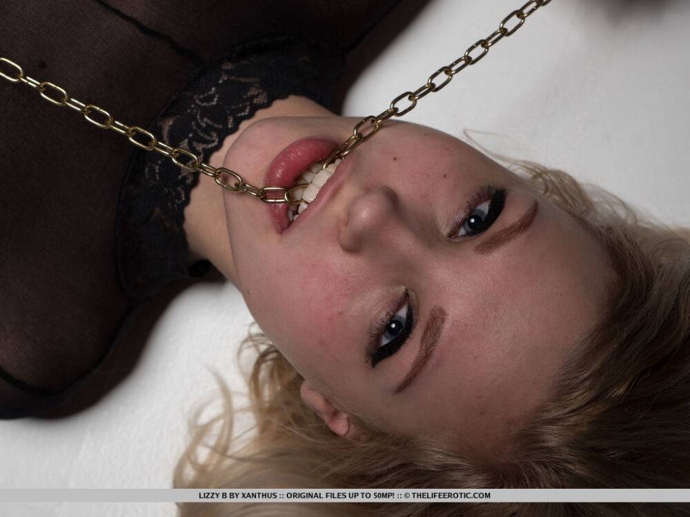 Lizzy B has her body tied up by golden chains and rubs it againts her - #5