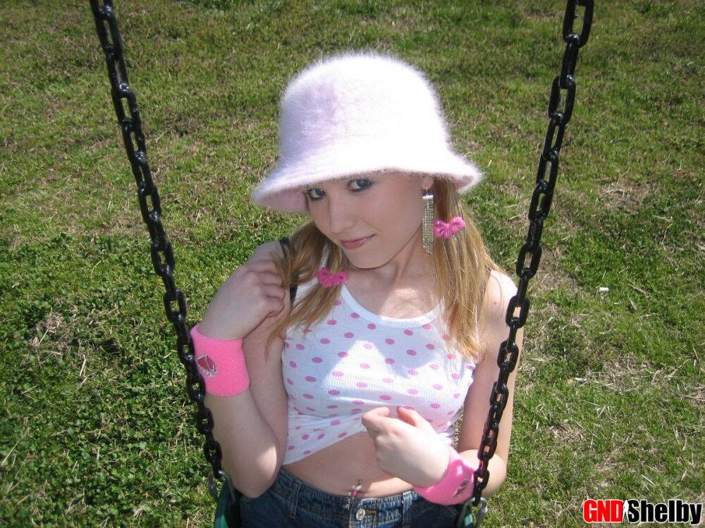 Teen slut Shelby teases with her perky perfect tits at the playground - #1