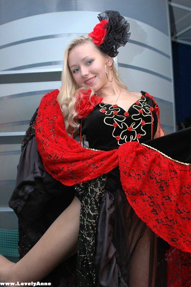 Cute blonde uncovers her great tits while removing a fancy dress - #6