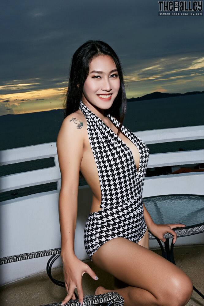 Beautiful Asian girl Linlin gets totally naked on a seaside balcony - #7