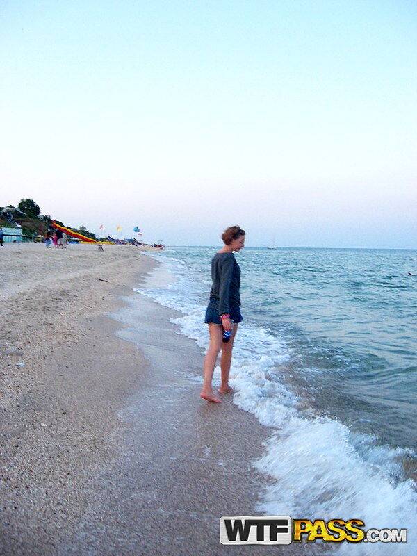 Amateur girl with red hair changes into a bikini before getting in the ocean - #12